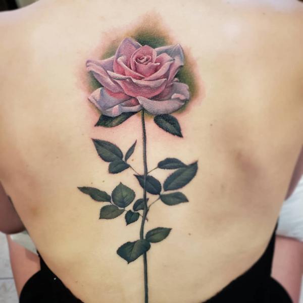 Pink and grey rose with stem back tattoo