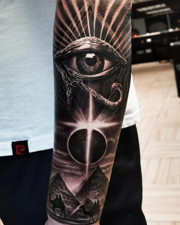 Realistic Eye of horus and Pyramid tattoo