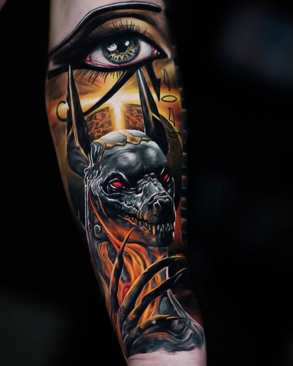 Realistic eye of Ra and Anubis tattoo