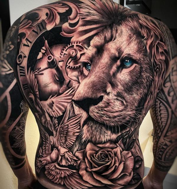 Realistic lion face and clock tattoo with dove and rose full back tattoo
