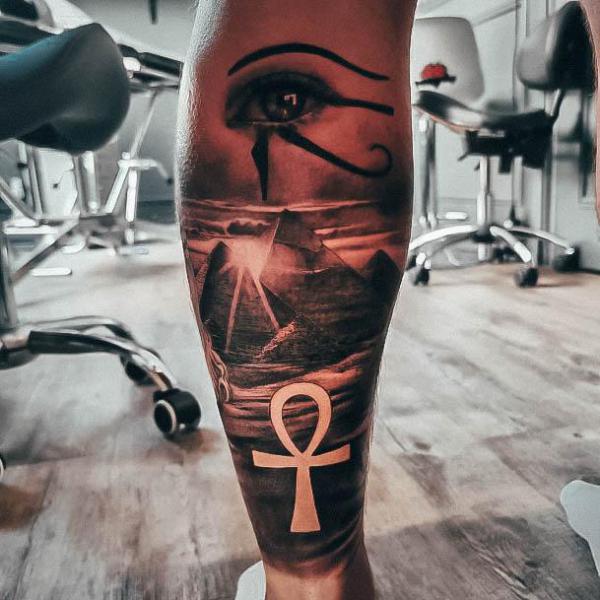 Realistic pyramid with eye of Horus and Ankh