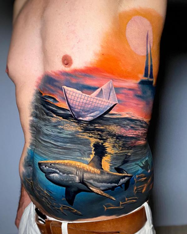 Realistic shark and origami boat