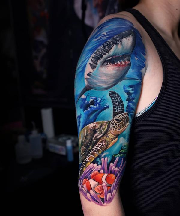 Realistic shark and sea turtle tattoo sleeve