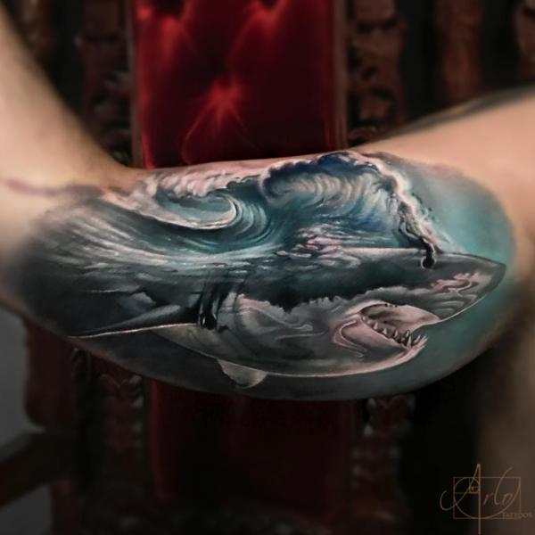 Realistic shark bicep tattoo