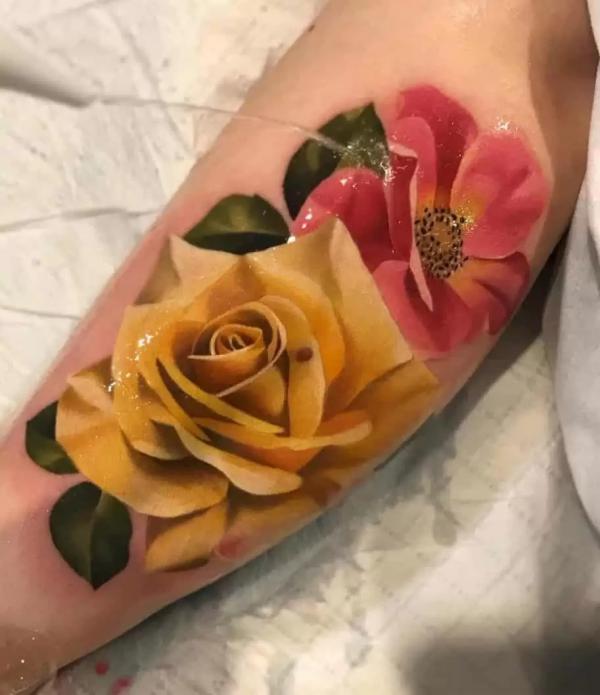 Realistic yellow rose and poppy tattoo