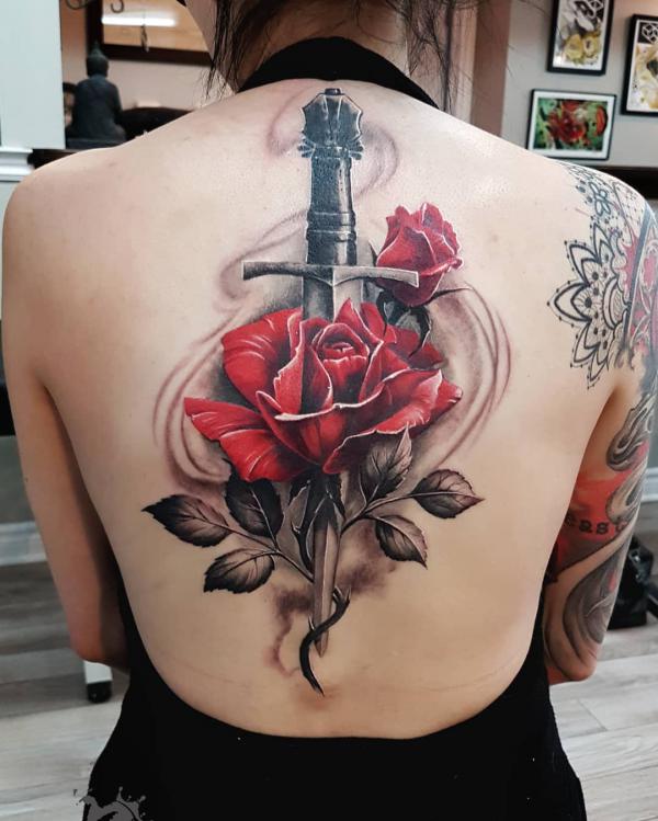 Rose and dagger back tattoo