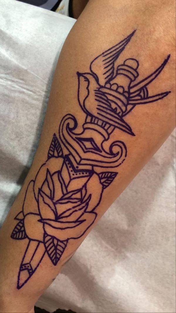 Rose and dagger outline with a bird tattoo