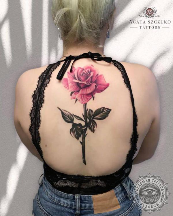 Rose with stem back tattoo