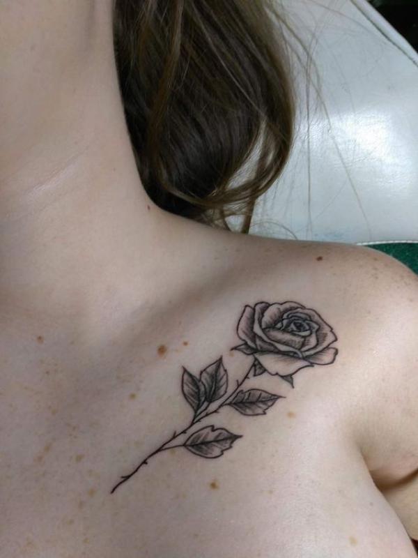 Rose with stem clavicle tattoo