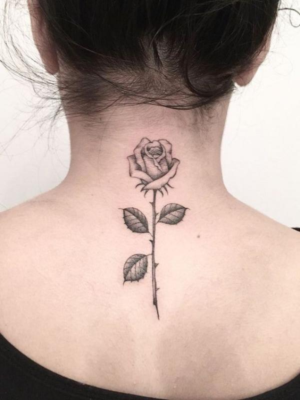 Rose with stem on the back of neck