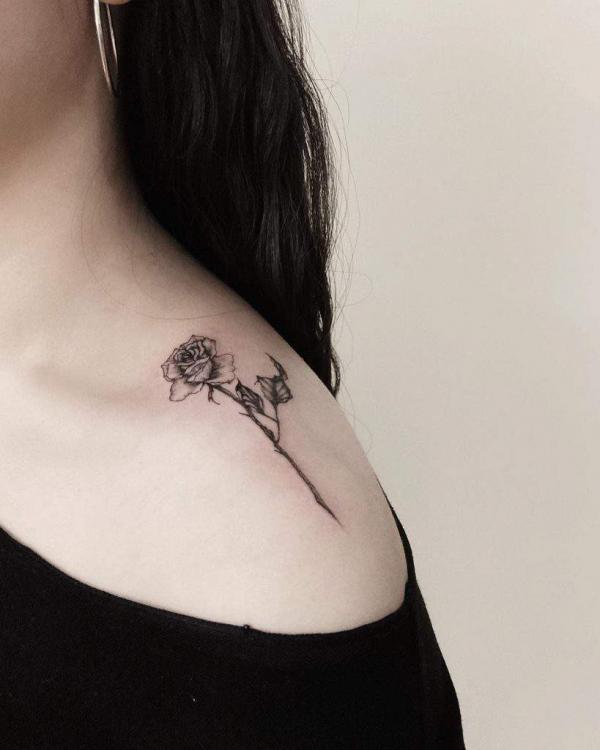 Rose with stem shoulder tattoo