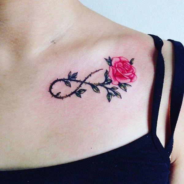 Rose with thorns infinity clavicle tattoo