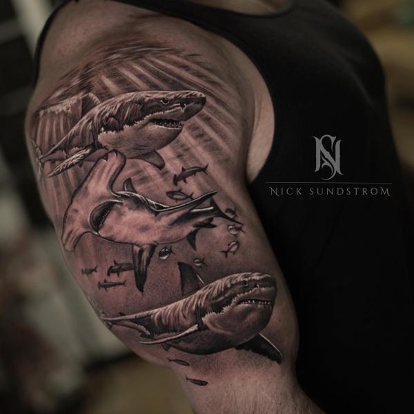 School of shark half sleeve tattoo