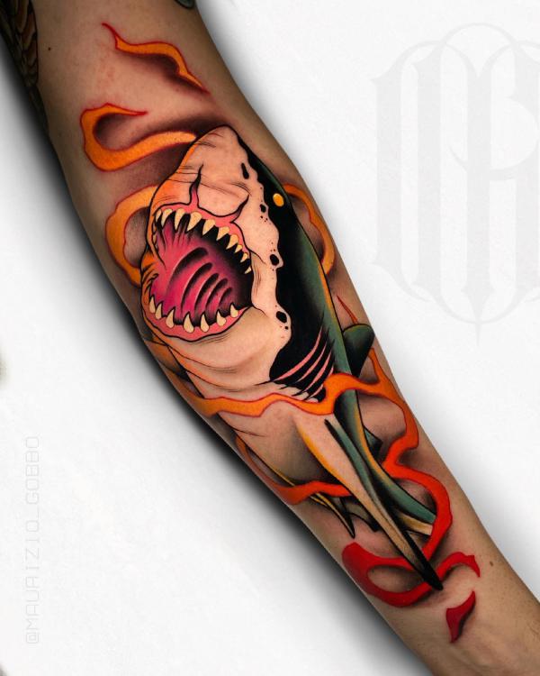 Shark forearm tattoo with flame