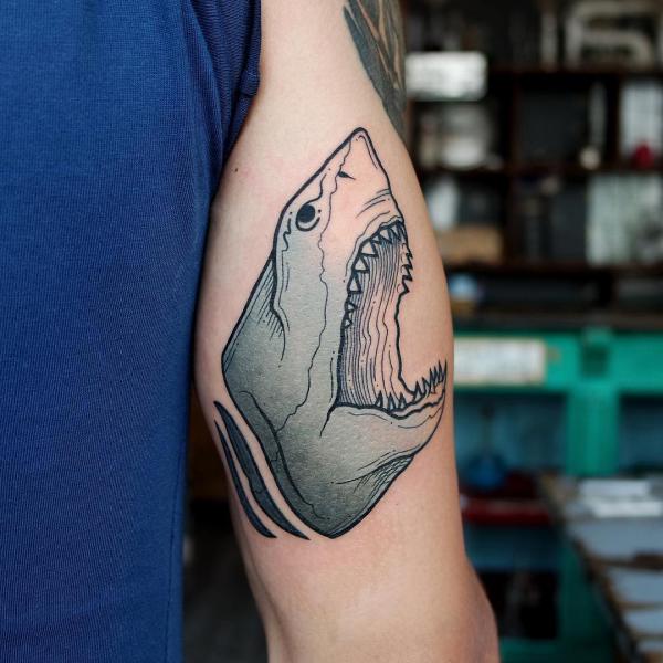 Shark head with open mouth bicep tattoo
