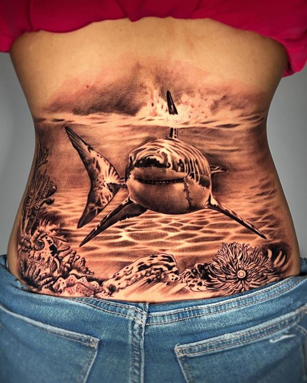 Shark low back tattoo