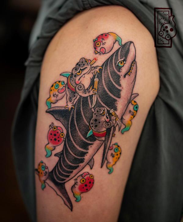 Shark surrounded by frog and fugu fish tattoo