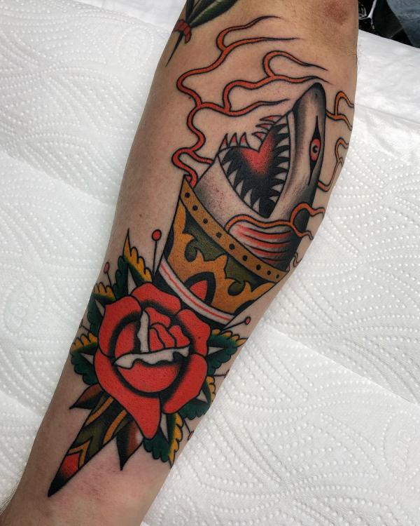 Shark torch with rose tattoo traditional style
