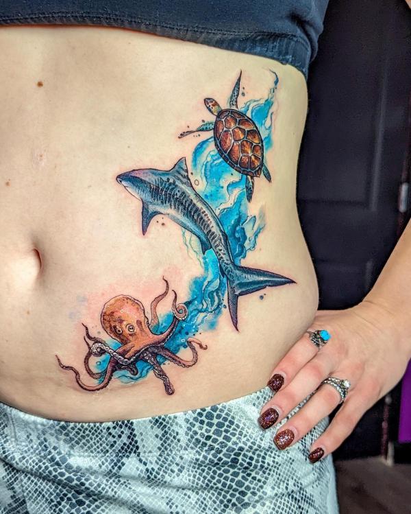 Shark with octopus and turtle tattoo