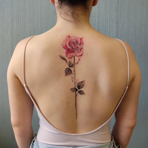 Single pink rose back tattoo with name