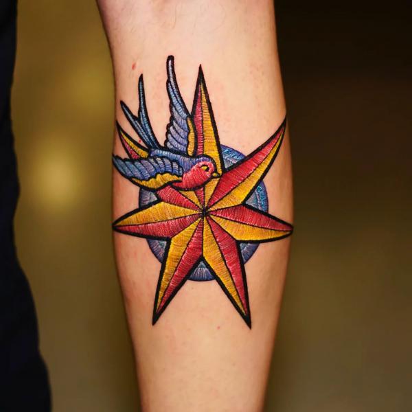 Six pointed star and swallow patch tattoo