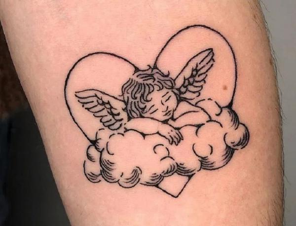 Sleeping cherub on clouds with love symbol