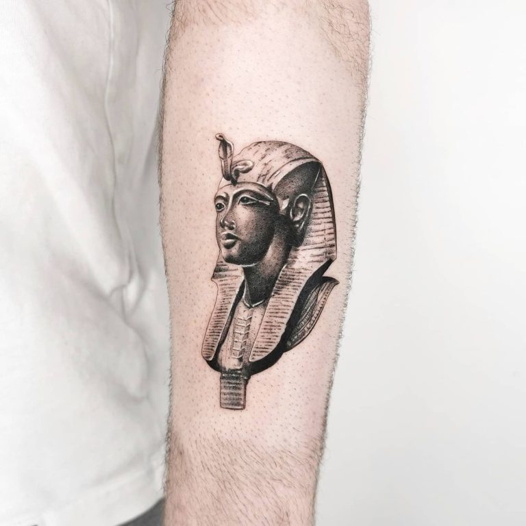 Small King Tut portrait tattoo black and grey