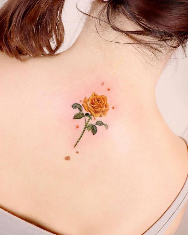 Yellow Rose Tattoo A Burst Of Sunshine On Your Skin Art And Design Small Yellow Rose Tattoo On Upper Back