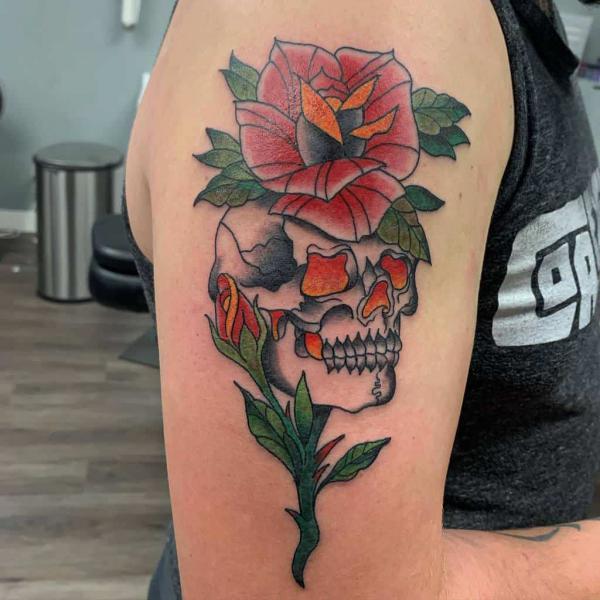 Stylized rose with stem and skull