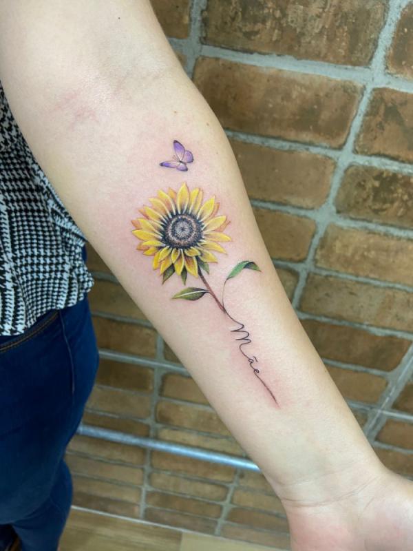 Sunflower and butterfly tattoo with word