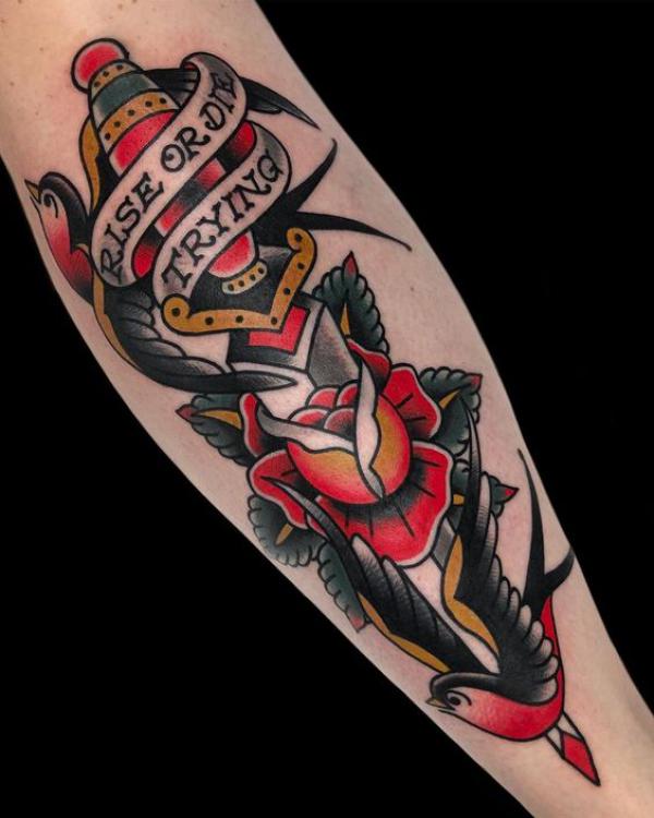 Swallow Rose and dagger with banner bearing words rise or die trying tattoo