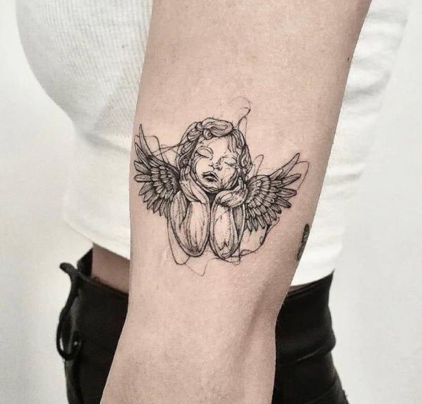 Thinking sketchy cherub tattoo