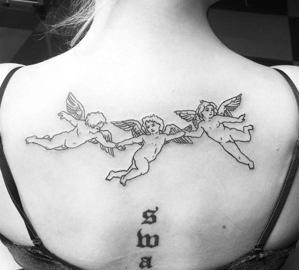 Three dancing cherubs back tattoo