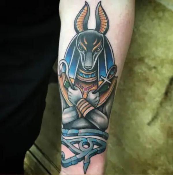Traditional Anubis and eye of Ra tattoo
