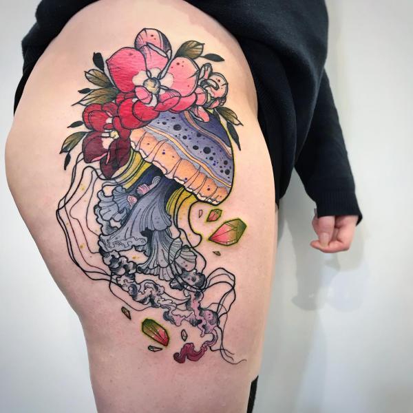 Traditional jellyfish and flower tattoo