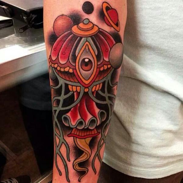 Traditional jellyfish and planets tattoo with an eye