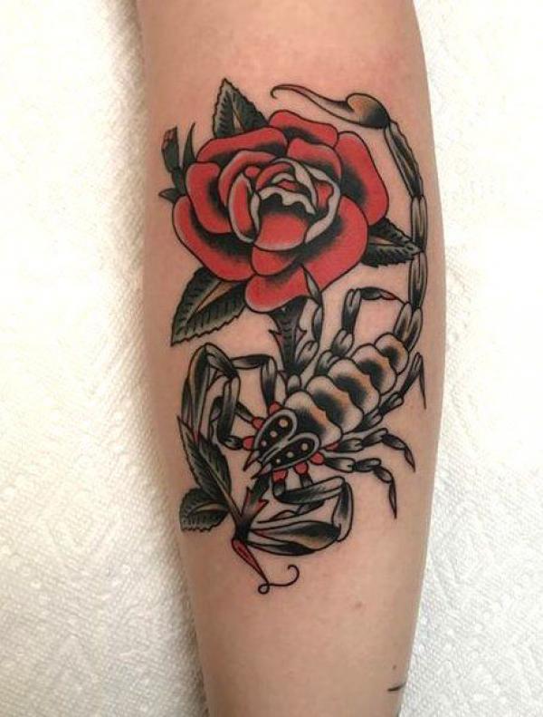 Traditional rose with stem and a scorpion tattoo