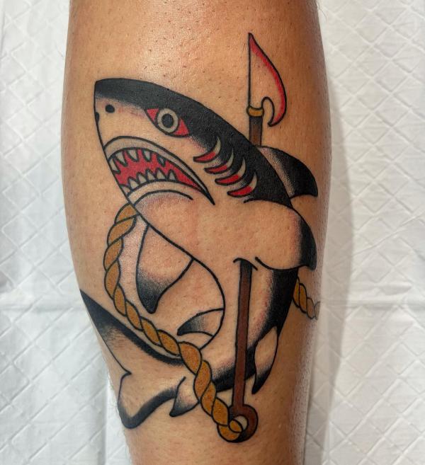 Traditional shark harpoon tattoo