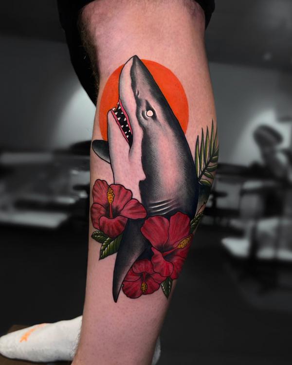 Traditional shark head with sun and hibiscus tattoo