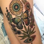 Traditional sunflower and butterfly tattoo