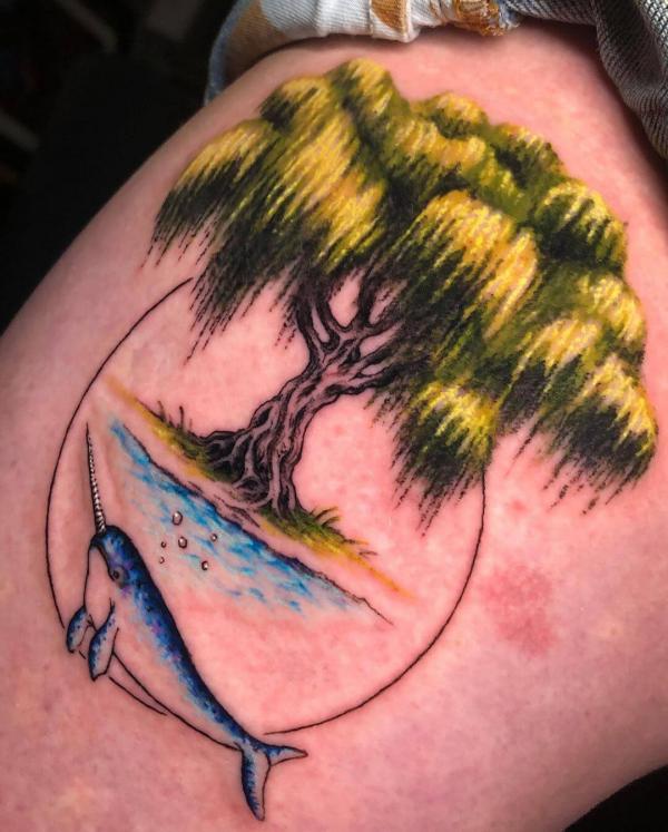 Traditional willow tree and fish tattoo