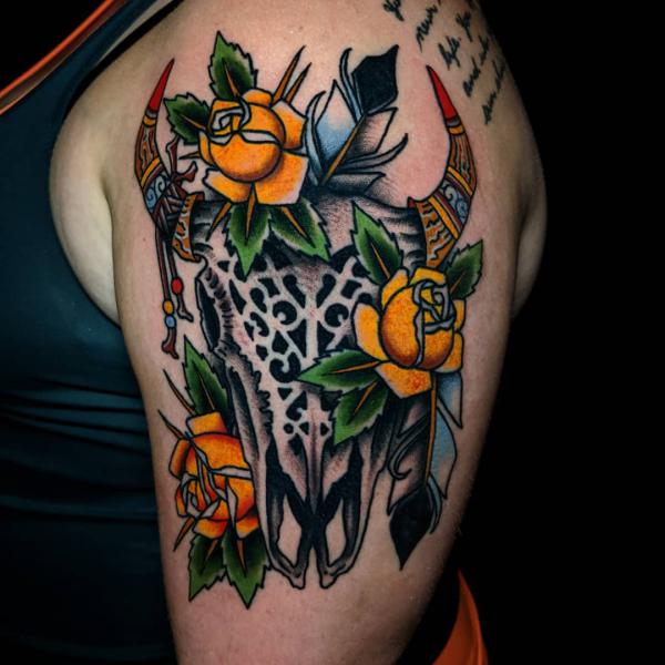 Traditional yellow roses and bull skull tattoo