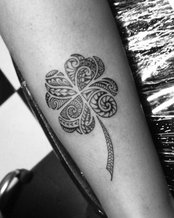Tribal four leaf clover tattoo