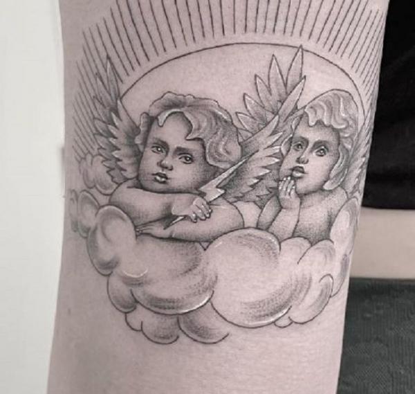 Two Cherubs with lightning bolt on cloud tattoo greyscale