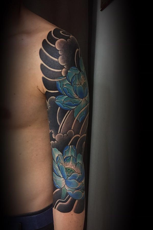 Two blue lotus Japanese tattoo sleeve