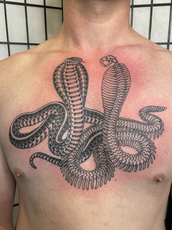 Two cobra skeleton tattoo
