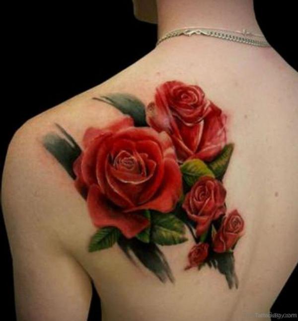Vibrant red shoulder blade tattoo