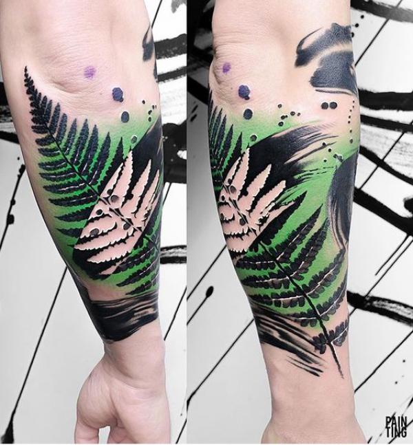 Watercolor fern forearm tattoo