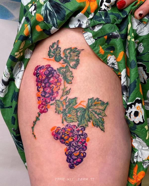 Watercolor grapes thigh tattoo