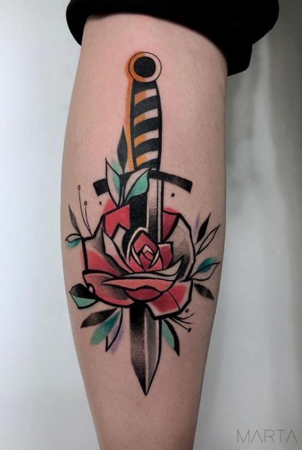 Watercolor rose and dagger tattoo